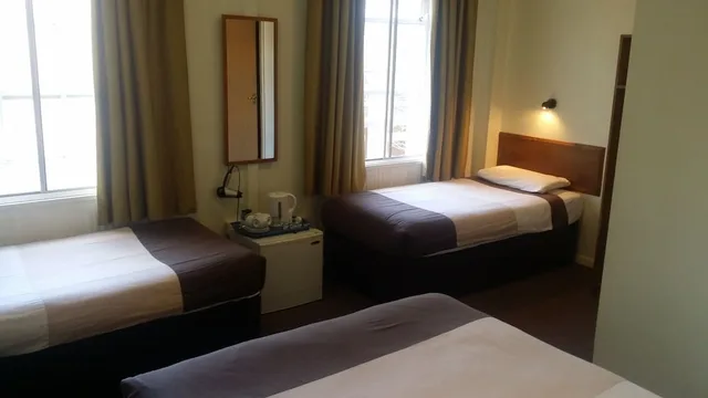 غرفة رباعية بسرير مزدوج وسريرين منفصلين، Arriva Hotel 10/10