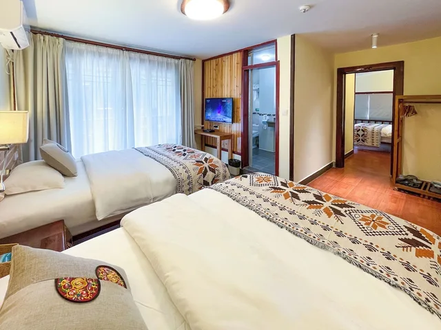 غرفة ثلاثية بثلاثة أسرّة، Snow Lion Riverside Resort 2/5