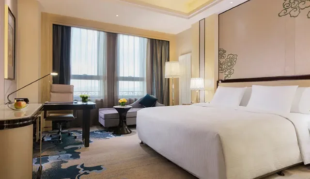 غرفة غراند ديلوكس بسرير كينج، Wanda Realm Chifeng Hotel 1/2