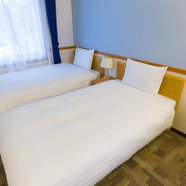 غرفة بسريرين منفصلين للمدخنين، Toyoko Inn Kokura-eki Shinkansen-guchi 1/10