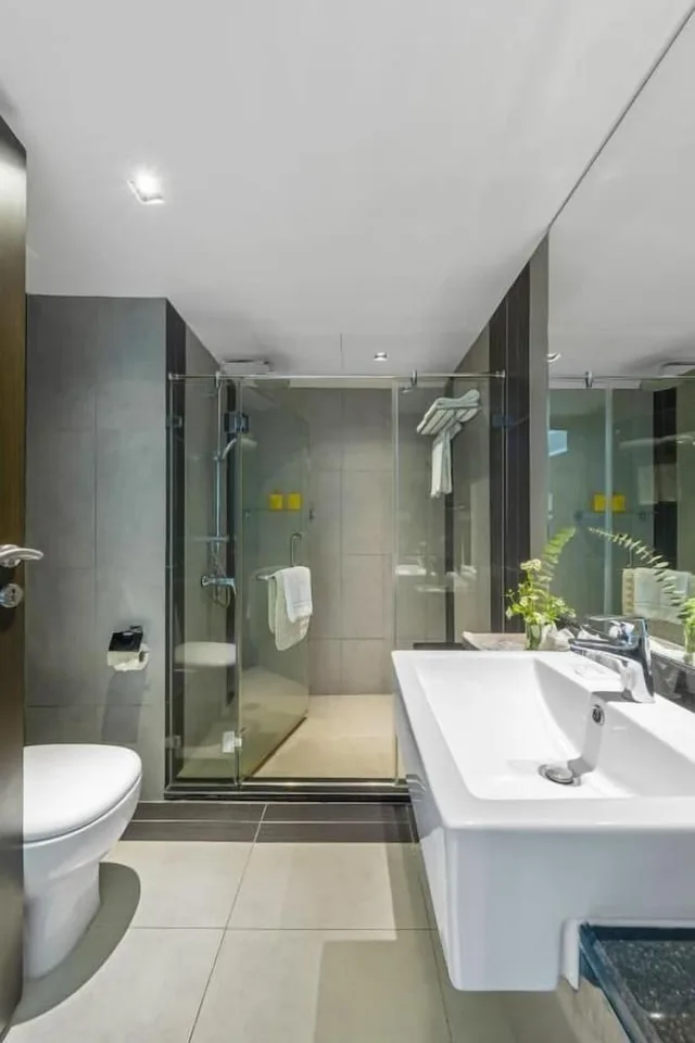 جناح عائلي بسريرين منفصلين وسرير كينج، Golden Tulip Mandison Suites 3/3