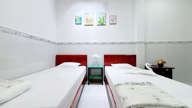 غرفة أساسية بسريرين منفصلين، Quoc Dinh Guesthouse 1/8