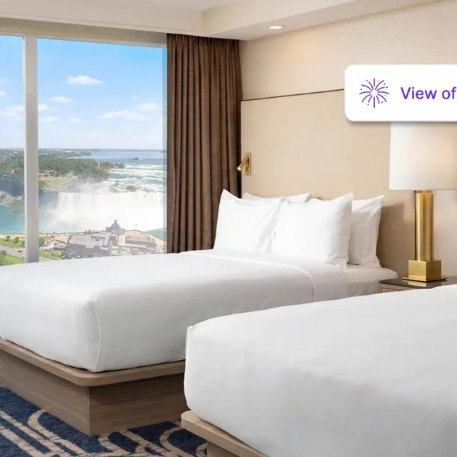 2 Rooms, Premium, Suite, 1 King and 2 Queen Beds, Falls View، Embassy Suites By Hilton Niagara Falls Fallsview 1/2