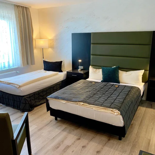 غرفة عائلية، Boutique Hotel Goldene Henne 1/5