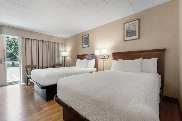 Room, 2 Double Beds, Exterior Entrance، Ramada by Wyndham State College Hotel & Conference Center 2/10