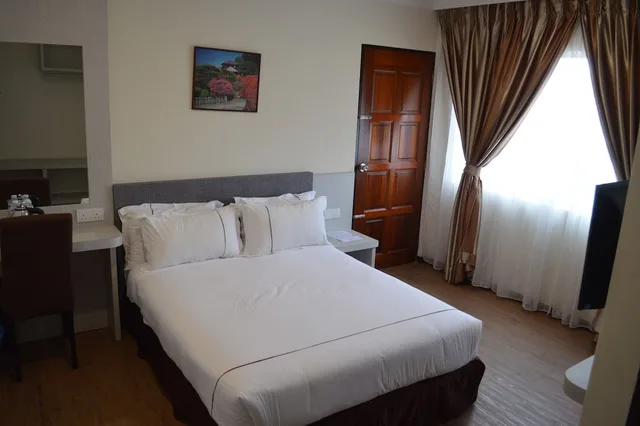 غرفة ديلوكس بسرير كوين، Angsoka Hotel Teluk Intan 1/2