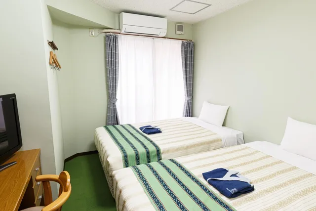 غرفة بسريرين منفصلين، Hotel Peaceland Kume 2/10