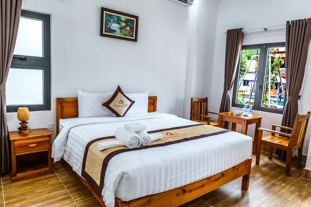 غرفة ديلوكس بسرير كينج بإطلالة على المسبح، Rainforest Resort Phu Quoc 1/1