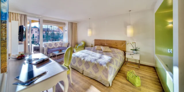 Sun, Twin Beds، Giardino Ascona 1/4