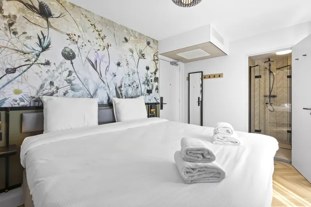 غرفة بسرير كينج وسرير كوين، Dutch Design Hotel Vondelpark 2/2