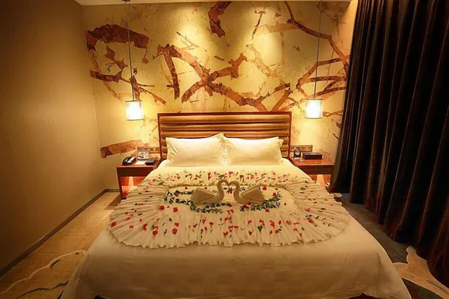 غرفة ديلوكس بسرير كينج وسرير كوين، Xige Garden Hotel 1/3