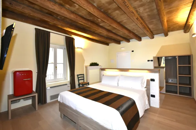 غرفة بسريرين منفصلين بإطلالة على الحديقة، Country House Le Palazzole 2/6