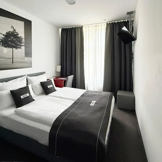 غرفة قياسية بسرير كينج وسرير كوين، Garner Hotel Berlin - Gendarmenmarkt by IHG 3/10