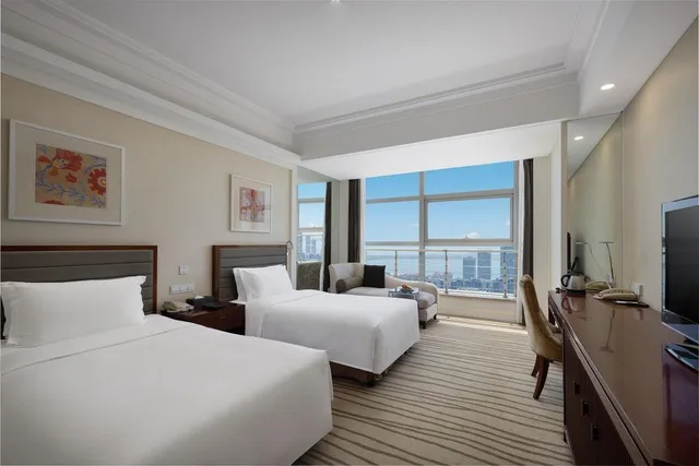 غرفة قياسية بإطلالة على البحر، New Century Hotel Qingdao 1/1
