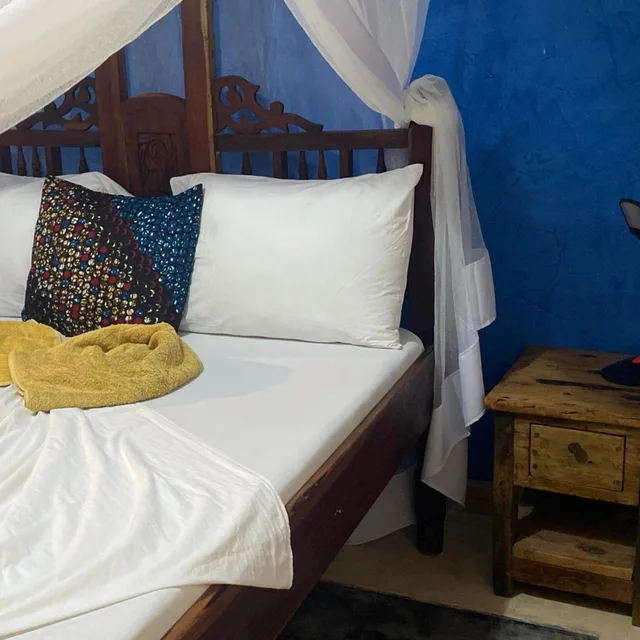 غرفة بسرير مزدوج بإطلالة على الحديقة، Mbuyuni Beach Village 9/10