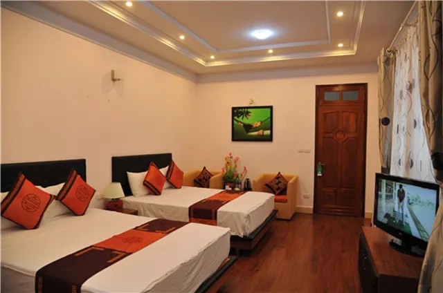 غرفة بريميوم ثلاثية بسرير كوين وسرير فردي بإطلالة على المدينة، Urban Alley Hotel 2/3
