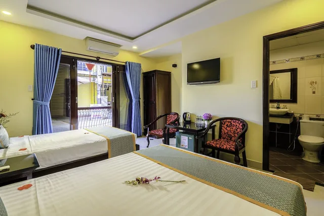 غرفة ديلوكس ثلاثية بسرير مزدوج وسرير فردي بغرفة نوم واحدة، Golden River Hotel 5/6