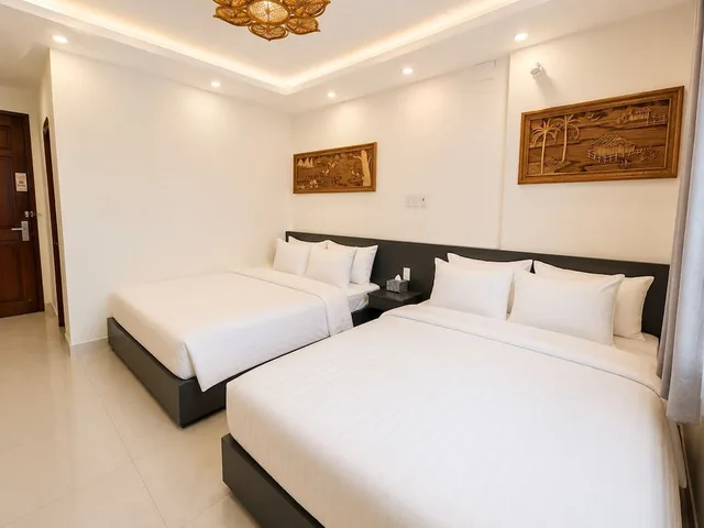 غرفة عائلية رباعية بسريرين كوين، Calmette Hotel 3/6