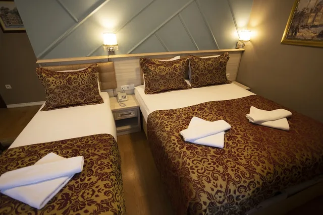 غرفة ثلاثية بثلاثة أسرّة، Tashkonak Hotel 5/8