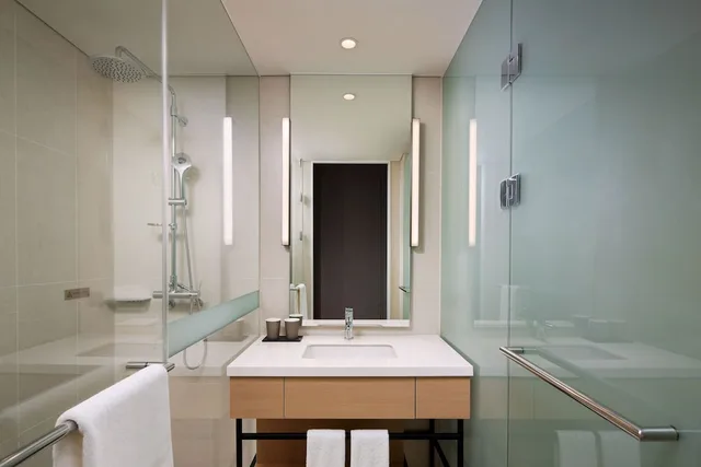 غرفة ديلوكس عائلية بسريرين مزدوجين بإطلالة على الحديقة، Shilla Stay Plus Iho Tewoo Ocean Front 2/2