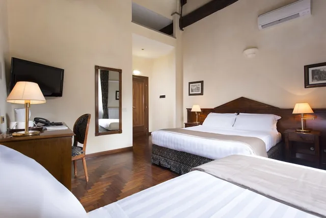 غرفة سوبيريور ثلاثية بسرير مزدوج وسرير فردي، Hotel Teatro Pace 1/4