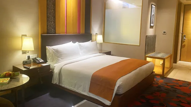 غرفة بسرير كينج بإطلالة على المسبح، Holiday Inn New Delhi Mayur Vihar Noida 6/9
