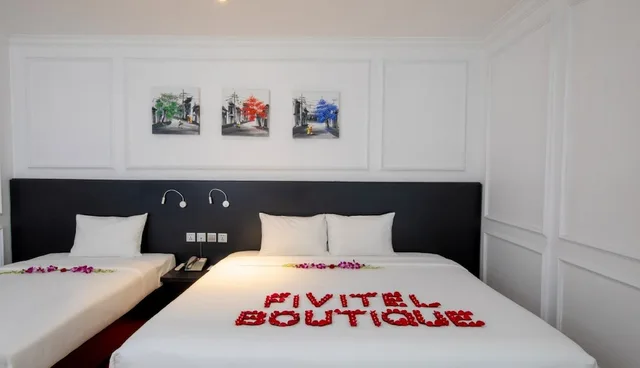 جناح عائلي بسرير كوين وسرير فردي بإطلالة على المدينة، Fivitel Boutique Da Nang 1/4