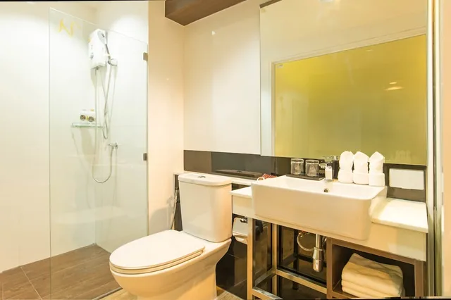 Deluxe, Triple, 1 King and 1 Single Beds, The Nice Hotel 3/3