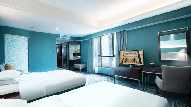غرفة ديلوكس عائلية بسرير مزدوج وسرير فردي مع سرير سحّاب إضافي، Shunde Grandview Hotel 1/2