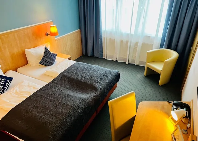 غرفة كلاسيكية بسريرين منفصلين، Konferenzhotel Ysenburger Hof 1/3