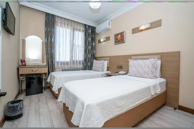 غرفة قياسية بسريرين منفصلين، Grand Reis Otel 1/4