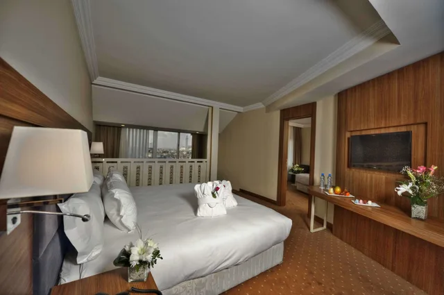 Duplex, Family, King Bed, Mosque View, Sofa، Kenzi Basma Hotel 5/9