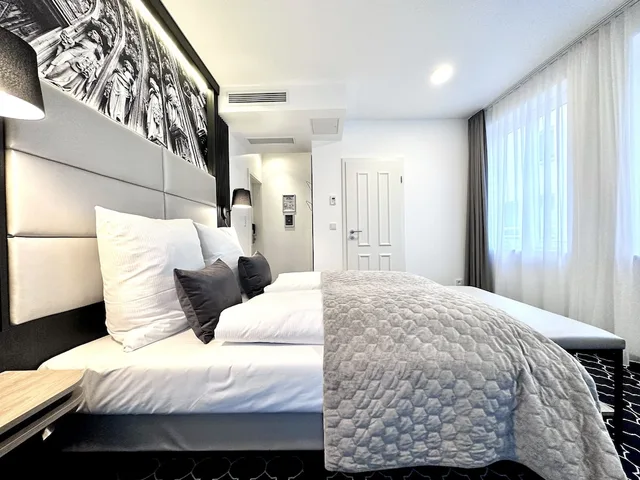 غرفة ديلوكس بسرير كينج، Rhein Hotel St.Martin 1/7