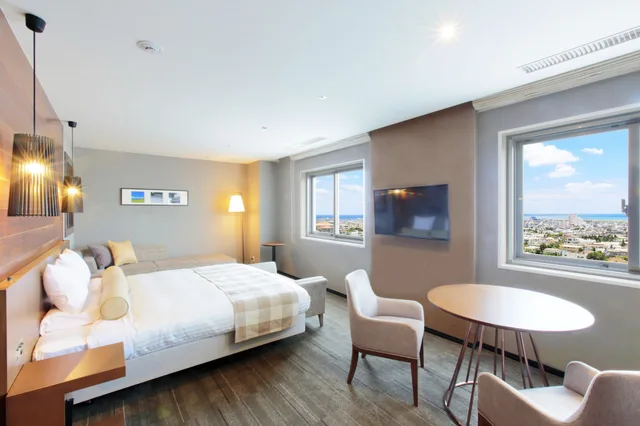 غرفة ديلوكس بسرير كوين بإطلالة على البحر، ART HOTEL ISHIGAKIJIMA 1/3