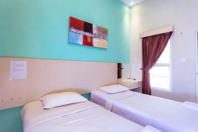 غرفة قياسية بسريرين منفصلين، Ardhya Guest House 2/9