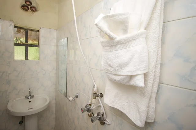 غرفة تنفيذية ثلاثية بثلاثة أسرّة، Dove Nest Lodge 4/4