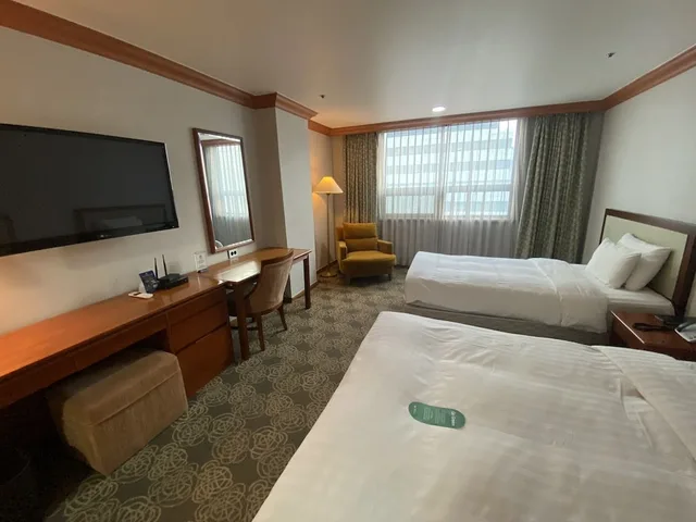 غرفة ديلوكس عائلية بسرير مزدوج وسرير فردي، Hotel International 2/4