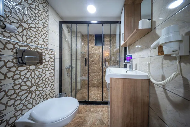 غرفة اقتصادية رباعية بسرير مزدوج وسريرين منفصلين بغرفة نوم واحدة، Laos Otel 9/10