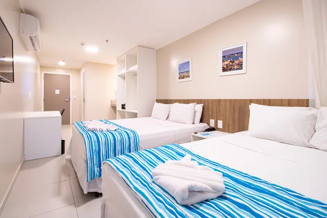 Standard Family Qdp - 2 double bed، Acqua Inn 1/2