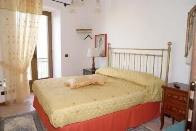 غرفة بسرير مزدوج بإطلالة على البحر بشرفة، Villa Donna Fausta 1/1