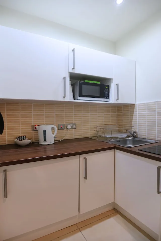 جناح تنفيذي بسرير مزدوج مع أريكة، Palmerston Suites 5/5