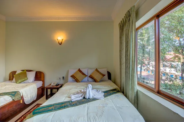 غرفة قياسية ثلاثية بسرير مزدوج وسرير فردي، Dv Angkor Villa 1/1