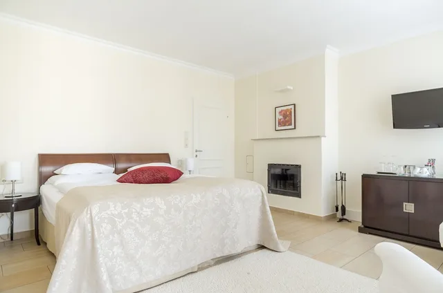 غرفة سوبيريور بسرير كينج بإطلالة على الحديقة مع أريكة، Hotel Spiess Spiess Appartement Pension 4/10
