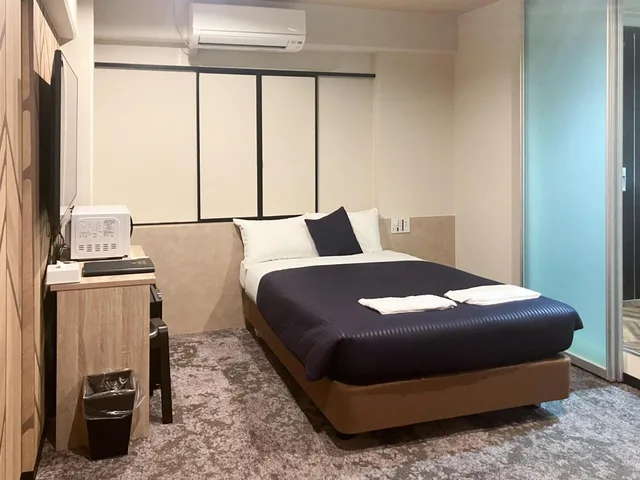 غرفة بريميوم مفردة للمدخنين، Hotel Livemax BUDGET Naha 1/1