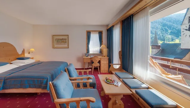 جناح جونيور بسريرين منفصلين، Morosani Posthotel 1/2