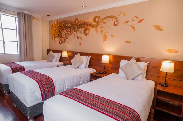 غرفة ديلوكس ثلاثية بسرير مزدوج وسرير فردي، Casa Biru Hotel Boutique 1/3