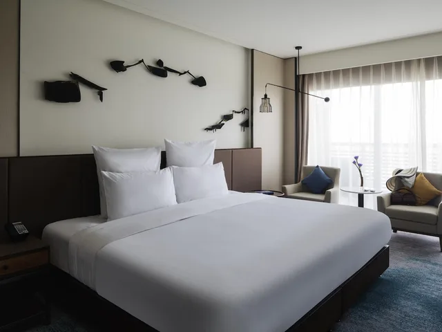 غرفة ديلوكس تنفيذية بسرير كينج مع دخول صالة النادي، Pullman Zhouzhuang 1/10