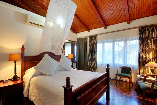 غرفة فاخرة بسرير كوين، St. Lucia Wetlands Guest House 1/1