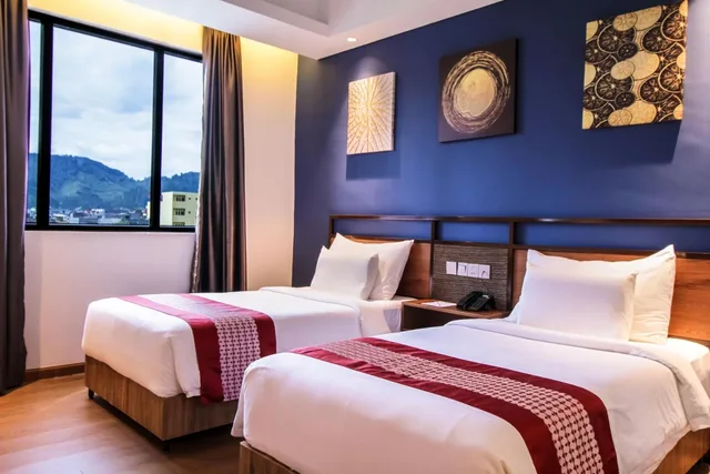 غرفة ديلوكس بسريرين منفصلين، Gayo Petro Hotel Takengon 1/8