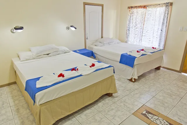 غرفة عائلية بسرير مزدوج وسرير فردي بغرفة نوم واحدة، Le Uaina Beach Resort 2/8
